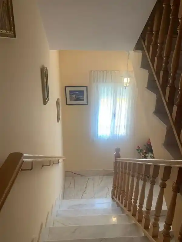 Bajada de escalera.